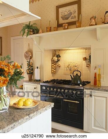 Black range oven in traditional country kitchen View Large Photo Image Stock Image - Black range oven in traditional country kitchen. Fotosearch