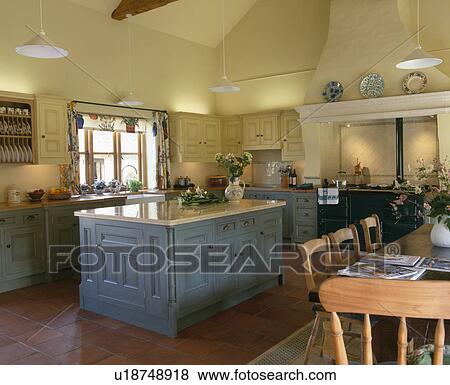 Blue island unit in traditional country kitchen View Large Photo Image Stock Photo - Blue island unit in traditional country kitchen. Fotosearch