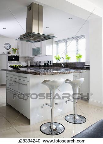 Stock Photography Of A Stools At Island Unit In Large Modern A Stools At Island Unit In Large Modern White Kitchen Extension
