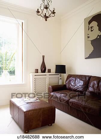 Brown Leather Sofa And Ottoman In Modern Cream Living Room