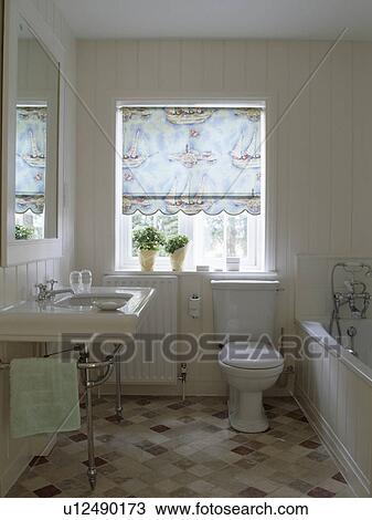 C P Hart basin in white panelled bathroom with boat-patterned blind View Large Photo Image Stock Image - C P Hart basin in white panelled bathroom with boat-patterned blind. Fotosearch