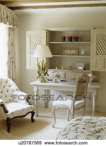 chair and small white desk in country bedroom View Large Photo Image Stock Photo - chair and small white desk in country bedroom. Fotosearch