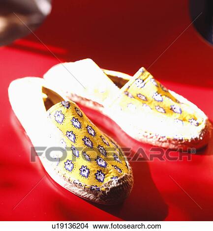 Close-up of a pair of yellow Provencal espadrilles View Large Photo Image Picture - Close-up of a pair of yellow Provencal espadrilles. Fotosearch