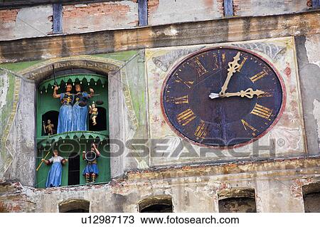 Close up of ancient clock on old building in Romania View Large Photo Image Stock Image - Close up of ancient clock on old building in Romania . Fotosearch