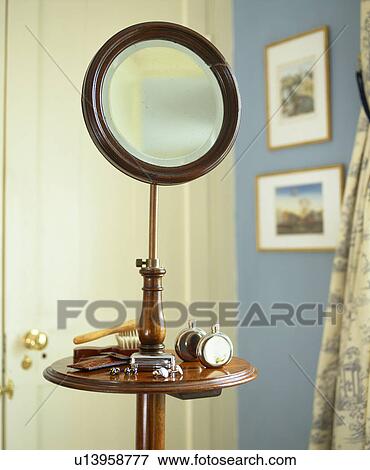 Stock Photo - Close-up of antique mirror on stand. Fotosearch