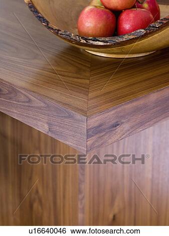 Close-up of apples in bowl on wood kitchen unit View Large Photo Image Stock Photograph - Close-up of apples in bowl on wood kitchen unit. Fotosearch