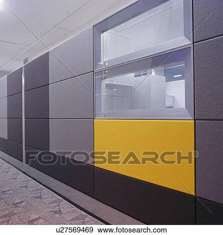 Stock Photo - Close-up of blue and yellow panels on modern landing. Fotosearch