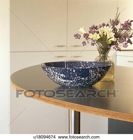 Close-up of blue bowl on table View Large Photo Image Picture - Close-up of blue bowl on table. Fotosearch