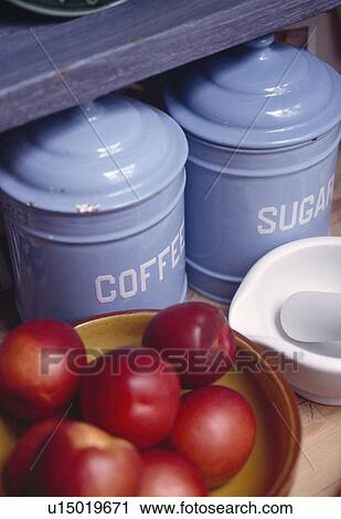 Close-up of blue enamel storage tins and bowl of red apples View Large Photo Image Stock Image - Close-up of blue enamel storage tins and bowl of red apples. Fotosearch