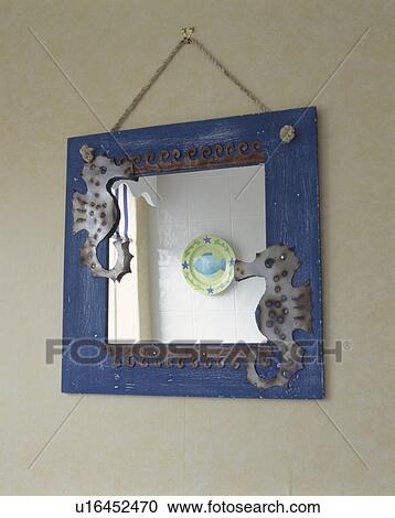 Close up of blue framed mirror with seahorse collage View Large Photo Image Stock Image - Close up of blue framed mirror with seahorse collage. Fotosearch