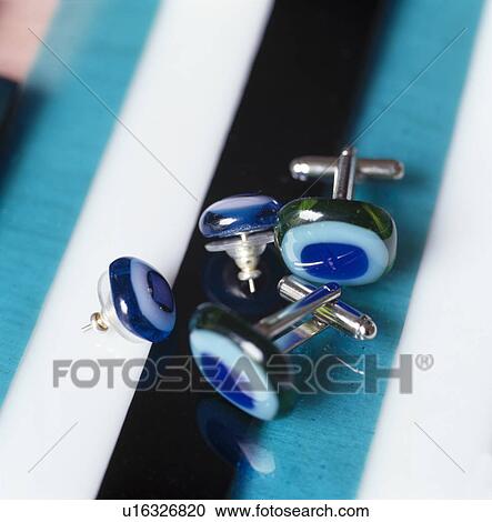 Close-up of blue glass cuff-links View Large Photo Image Stock Image - Close-up of blue glass cuff-links. Fotosearch