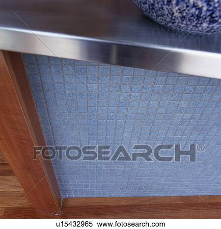 Close-up of blue mosaic tiled kitchen unit with stainless steel worktop View Large Photo Image Stock Photography - Close-up of blue mosaic tiled kitchen unit with stainless steel worktop. Fotosearch