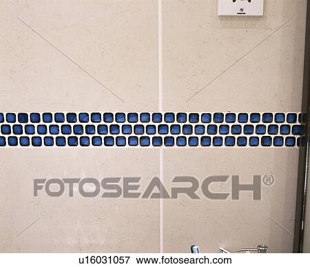 Close-up of blue mosaic tiles with white wall tiles View Large Photo Image Stock Photo - Close-up of blue mosaic tiles with white wall tiles. Fotosearch
