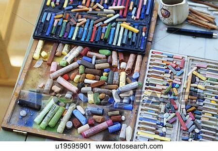 Stock Image - Close-up of boxes of pastel crayons. Fotosearch