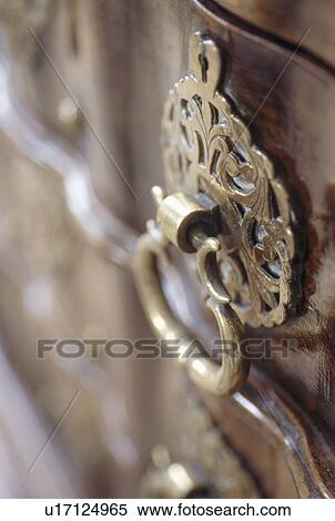 Close-up of brass drawer handle View Large Photo Image Stock Photography - Close-up of brass drawer handle. Fotosearch