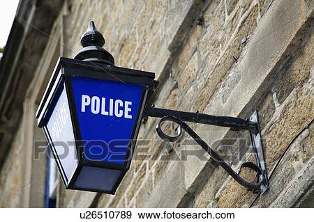 Close up of bright blue glass British Police lamp on wall View Large Photo Image Stock Photo - Close up of bright blue glass British Police lamp on wall . Fotosearch