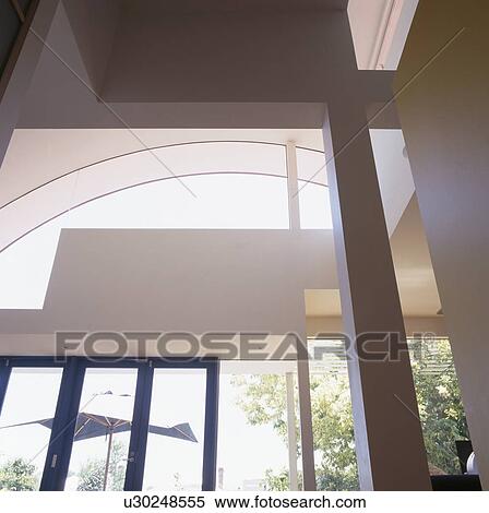 Stock Photography - Close-up of ceiling in modern white hall. Fotosearch