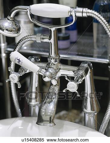 Close-up of chrome bath taps and showerspray View Large Photo Image Stock Photography - Close-up of chrome bath taps and showerspray. Fotosearch