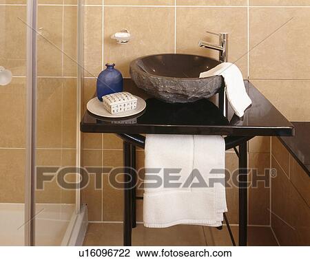 Close-up of chrome tap and polished granite basin on black table View Large Photo Image Stock Image - Close-up of chrome tap and polished granite basin on black table. Fotosearch