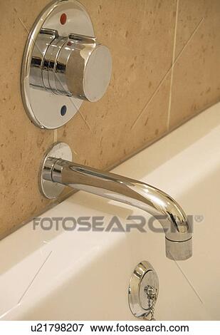 Stock Photo - Close-up of chrome tap. Fotosearch