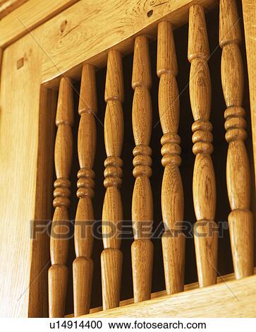 Close-up of cupboard door with an insert of turned spindles View Large Photo Image Stock Image - Close-up of cupboard door with an insert of turned spindles. Fotosearch
