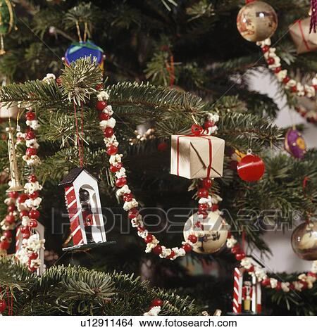 Picture - Close-up of decorations on Christmas tree. Fotosearch