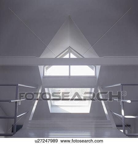 Close Up Of Dormer Window And Metal Bannisters In Modern White