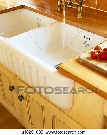 Stock Photo - Close-up of double Belfast sink. Fotosearch