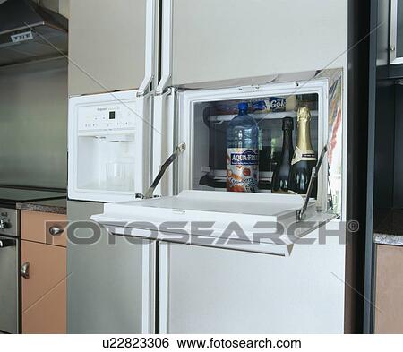 Close-up of drinks cooler in American-style fridge-freezer View Large Photo Image Stock Photograph - Close-up of drinks cooler in American-style fridge-freezer. Fotosearch