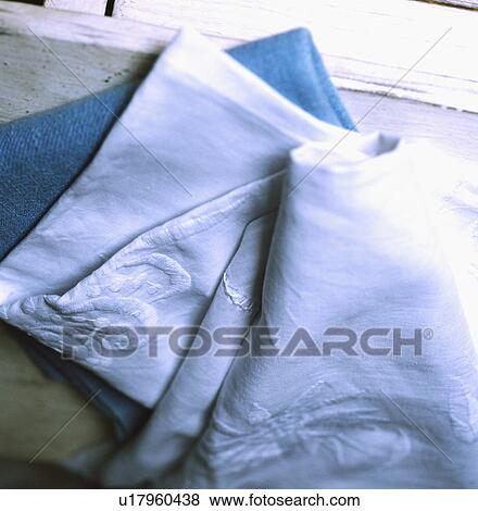 Stock Photo - Close-up of embroidered white cotton fabric. Fotosearch