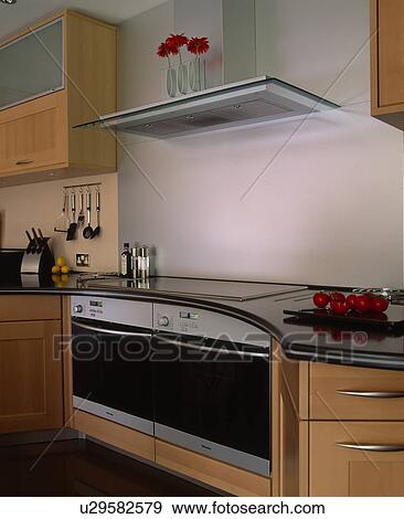 Stock Photo - Close-up of extractor above oven. Fotosearch