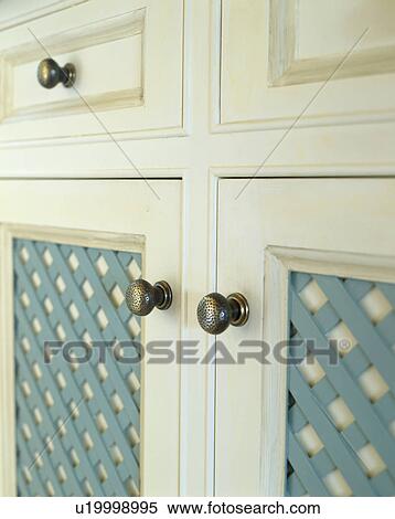 Close-up of Farrow+Ball cream and turquoise painted kitchen cupboard View Large Photo Image Stock Photography - Close-up of Farrow+Ball cream and turquoise painted kitchen cupboard. Fotosearch