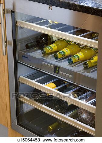 Stock Photo - Close-up of fitted wine-cooler. Fotosearch