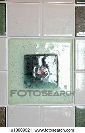 Close-up of green glass and white ceramic tiles View Large Photo Image Stock Image - Close-up of green glass and white ceramic tiles. Fotosearch