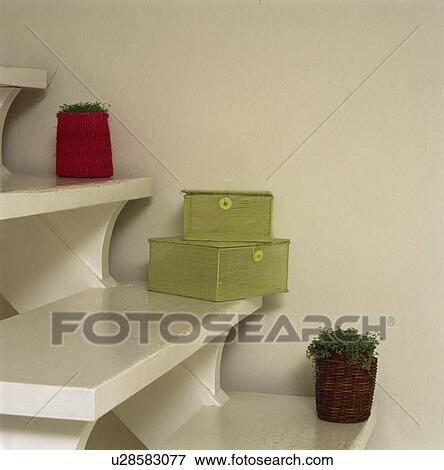 Close-up of green mesh boxes on white stairs View Large Photo Image Stock Photo - Close-up of green mesh boxes on white stairs. Fotosearch