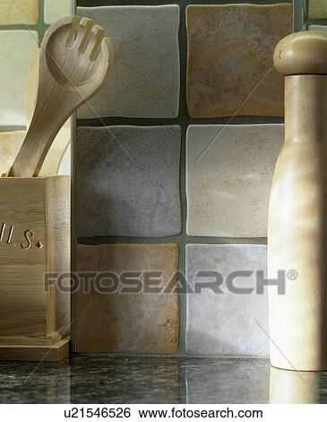 Stock Photograph - Close-up of grey and beige ceramic wall tiles. Fotosearch