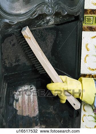 Close-up of hand wearing rubber glove cleaning and renovating old fireplace View Large Photo Image Stock Image - Close-up of hand wearing rubber glove cleaning and renovating old fireplace. Fotosearch