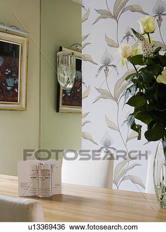 Stock Photograph - Close-up of iris-patterned wallpaper and dining room table. Fotosearch