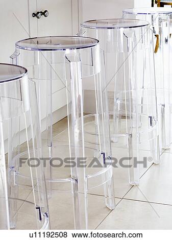 Close-up of Kartell perspex stools View Large Photo Image Stock Photo - Close-up of Kartell perspex stools. Fotosearch