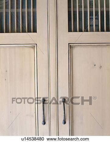 Stock Image - Close-up of kitchen storage cupboard. Fotosearch