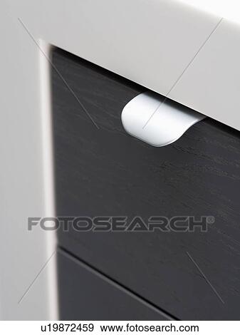 Stock Photo - Close-up of kitchen storage drawer. Fotosearch