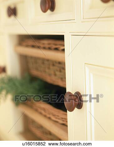Stock Image - Close-up of kitchen storage drawers. Fotosearch