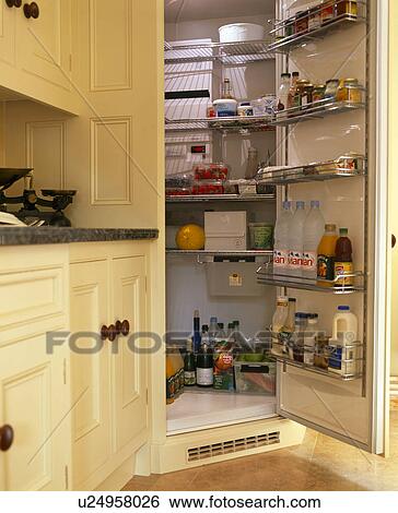 Close-up of larder fridge with door open View Large Photo Image Stock Photograph - Close-up of larder fridge with door open. Fotosearch
