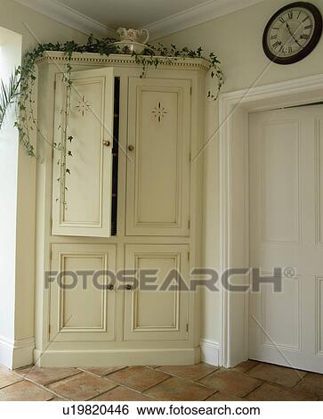 Close-up of large white fitted cupboard View Large Photo Image Stock Photograph - Close-up of large white fitted cupboard. Fotosearch