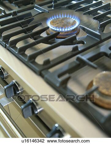Close-up of lighted gas ring on hob View Large Photo Image Stock Image - Close-up of lighted gas ring on hob. Fotosearch
