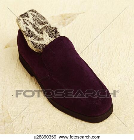 Stock Photo - Close-up of man's black suede shoe. Fotosearch