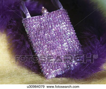 Close-up of mauve beaded handbag View Large Photo Image Stock Photo - Close-up of mauve beaded handbag. Fotosearch