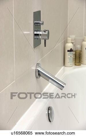 Stock Photography - Close-up of modern chrome tap. Fotosearch