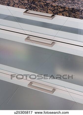 Close-up of modern kitchen storage drawers View Large Photo Image Stock Photo - Close-up of modern kitchen storage drawers. Fotosearch