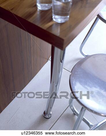 Stock Photography - Close-up of modern table and chair. Fotosearch